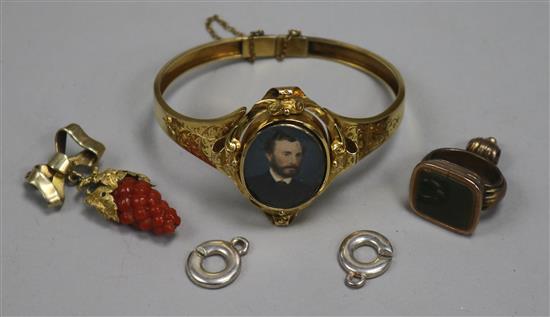 A Victorian gold hinged bangle with inset portrait miniature, a seal and pendant etc.